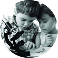 Two kids learning micro scope | Fastrackids